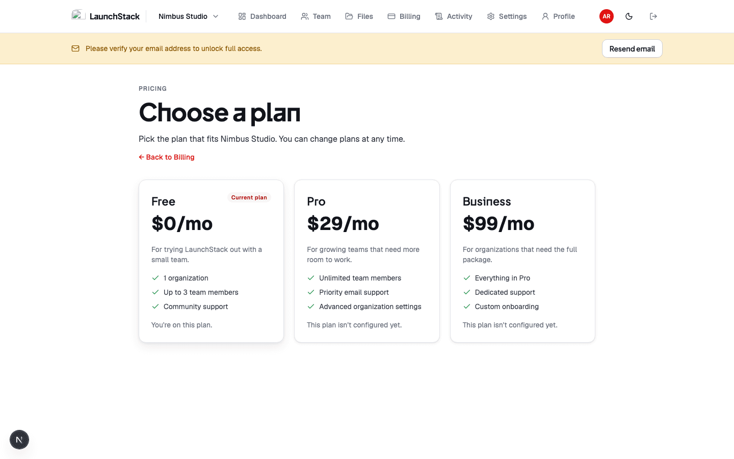 Pricing page with Free, Pro, and Business plans
